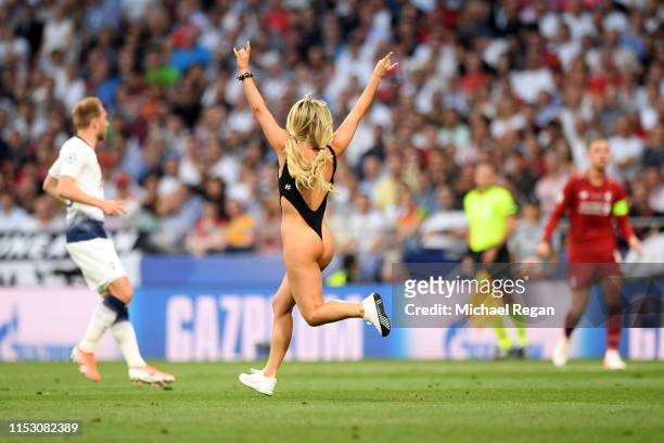 Pitch invader Kinsey Wolanski runs onto the field during the UEFA Champions League Final between Tottenham Hotspur and Liverpool at Estadio Wanda...