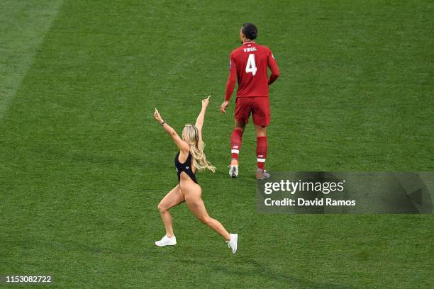 Pitch invader Kinsey Wolanski runs onto the field during the UEFA Champions League Final between Tottenham Hotspur and Liverpool at Estadio Wanda...