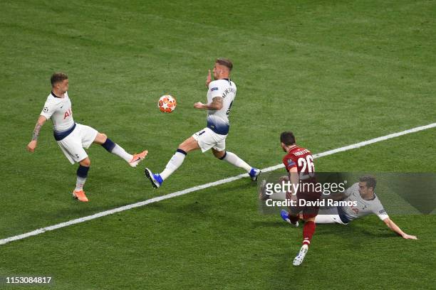 Andy Robertson of Liverpool shoots towards goal during the UEFA Champions League Final between Tottenham Hotspur and Liverpool at Estadio Wanda...