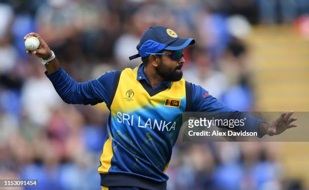 Lahiru Thirimanne of Sri Lanka fields the ball during the Group Stage match of the ICC Cricket World Cup 2019 between New Zealand and Sri Lanka at...