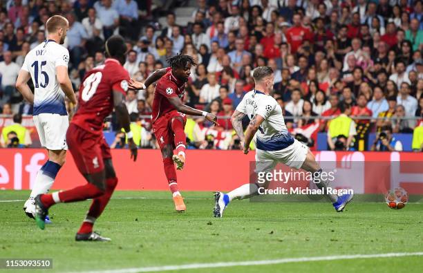 Divock Origi of Liverpool scores his sides second goal during the UEFA Champions League Final between Tottenham Hotspur and Liverpool at Estadio...