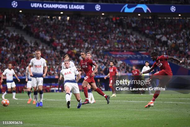 Divock Origi of Liverpool scores his sides second goal during the UEFA Champions League Final between Tottenham Hotspur and Liverpool at Estadio...