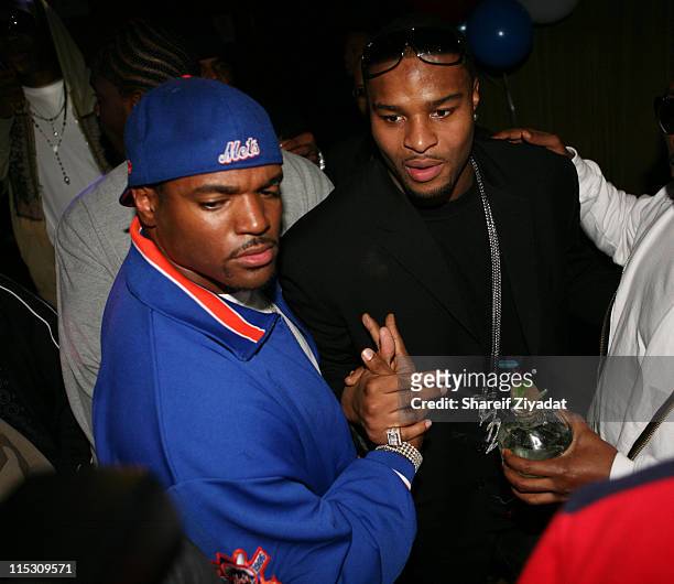 Osi Umenyiora and Dwight Freeney during Osi Umenyiora of the New York Giants Birthday Party - November 15, 2006 at Marquee in New York City, New...