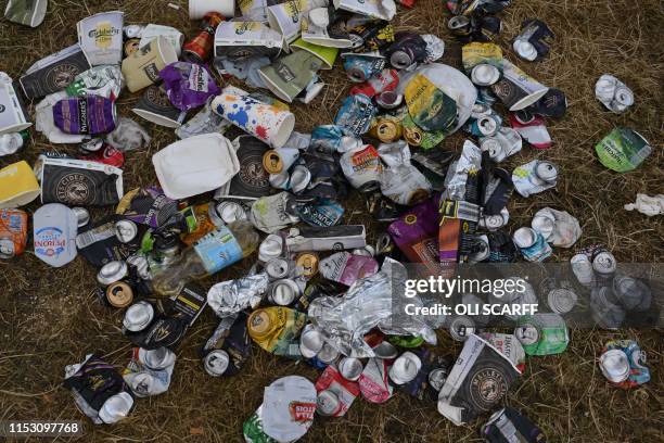 Rubbish lies on the ground in front of the pyramid stage at Glastonbury Festival of Music and Performing Arts on Worthy Farm near the village of...