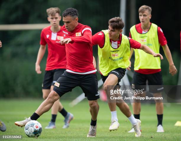 Left: Manuel Schmiedebach of 1 FC Union Berlin during the sports training camp at Waldstadion on July 1, 2019 in Bad Saarow, Germany.