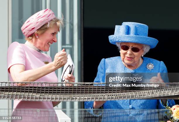 Julia Budd, Chairman of Epsom Racecourse and Queen Elizabeth II attend 'Derby Day' of the Investec Derby Festival at Epsom Racecourse on June 1, 2019...