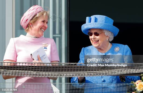 Julia Budd, Chairman of Epsom Racecourse and Queen Elizabeth II attend 'Derby Day' of the Investec Derby Festival at Epsom Racecourse on June 1, 2019...