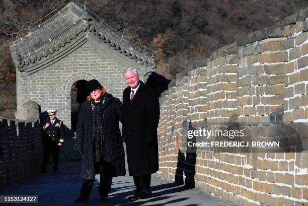 Secretary of Defense Robert Gates and his wife Becky pose for pictures during a visit the Great Wall at Mutianyu on the outskirts of Beijing on...