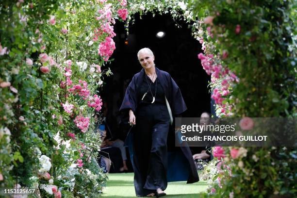 Italian fashion designer Maria Grazia Chiuri for Christian Dior acknowledges the audience at the end of the Christian Dior's Women Fall-Winter...