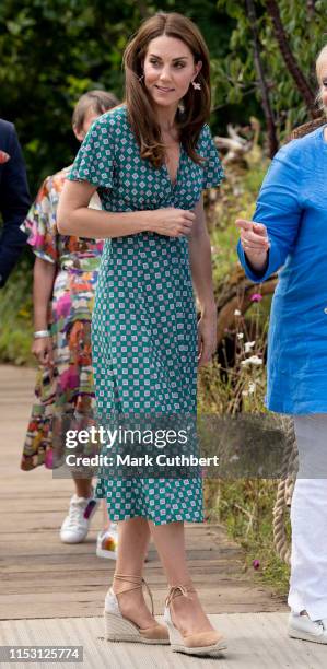 Catherine, Duchess of Cambridge visits The RHS Back to Nature Garden she designed at the 2019 RHS Hampton Court Palace Flower Show at Hampton Court...