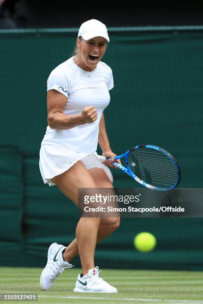 Yulia Putintseva celebrates during her Ladies Singles 1st Round match against Naomi Osaka on Day 1 of The Championships - Wimbledon 2019 at the All...