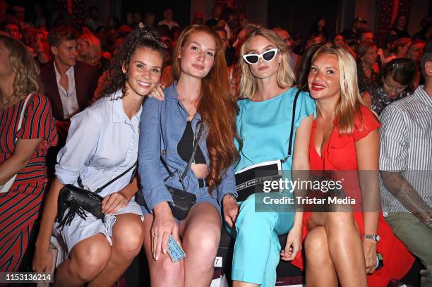 Betty Taube, Jana Heinisch, Kim Hnizdo and Evelyn Burdecki attend the Guido Maria Kretschmer fashion show during the Berlin Fashion Week...