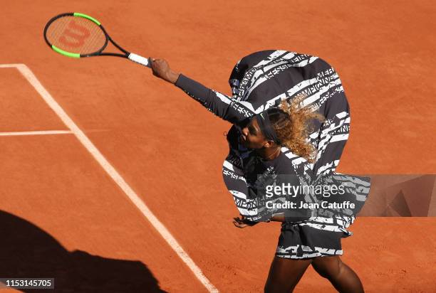Serena Williams of USA wears a special warm up Nike jacket - with French text reading 'Champion, Championne', 'Queen, Reine', 'Goddess, Deesse' and...
