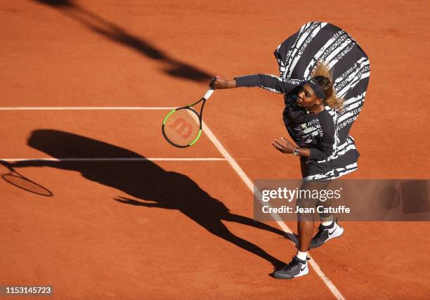 Serena Williams of USA wears a special warm up Nike jacket - with French text reading 'Champion, Championne', 'Queen, Reine', 'Goddess, Deesse' and...