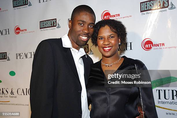 Arvill Poe with wife Carmencita Poe during Turks & Caicos International Film Festival Celebrates in Atlanta - Red Carpet Arrivals at World Trade...