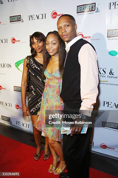 April Griggs, Shamari DeVoe and husband Ron DeVoe