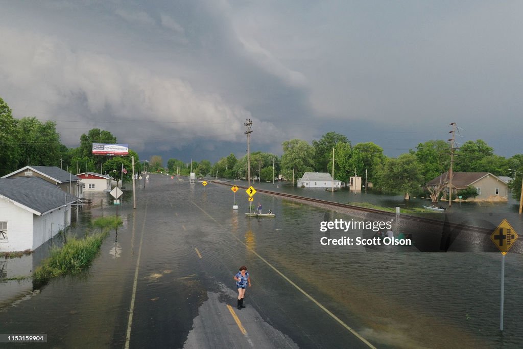 Midwest Rivers Reach Major Flood Stage At Historic Levels