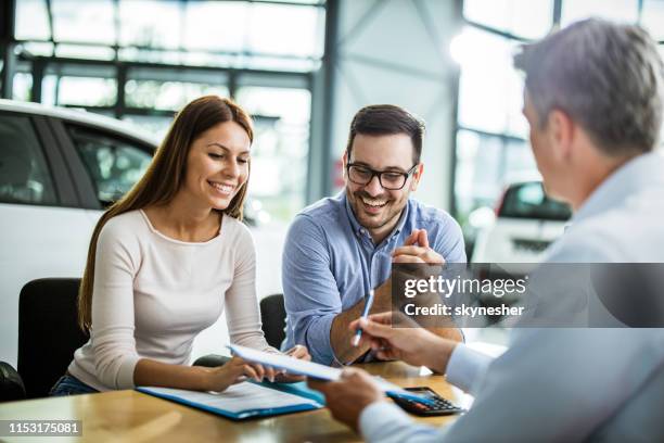 just sign the contract and the car is yours! - car inside showroom stock pictures, royalty-free photos & images