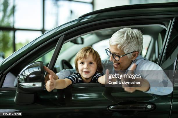 we like this car very much! - test drive stock pictures, royalty-free photos & images