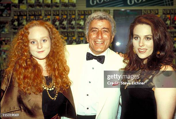 American Pop and Jazz musician Tony Bennett poses with his daughters, Antonia and Joanna, as they attend a CD release event at at a Sam Goody record...