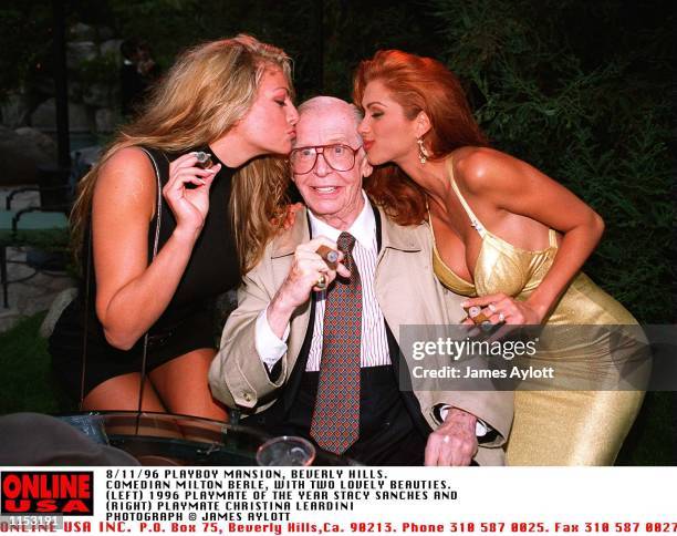 8/11/96 PLAYBOY MANSION, BEVERLY HILLS. LIVING LEGEND MILTON BERLE GETS A PECK ON THE CHEEK FROM PLAYMATE OF THE YEAR 96 STACY SANCHES, AND PAYBOY...