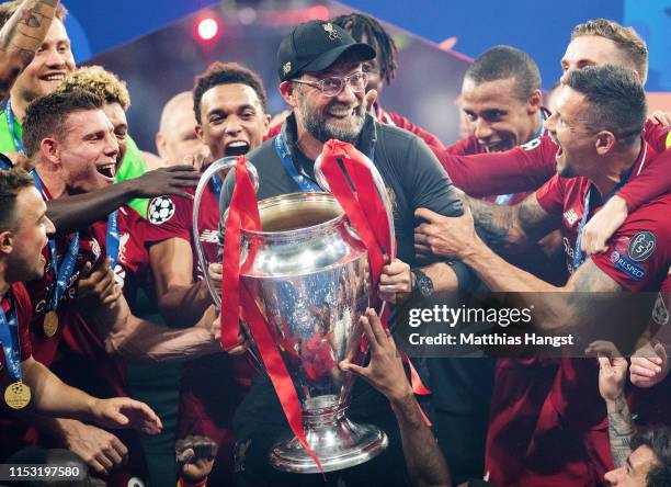 Jurgen Klopp, Manager of Liverpool celebrates with the Champions League Trophy after winning the UEFA Champions League Final between Tottenham...