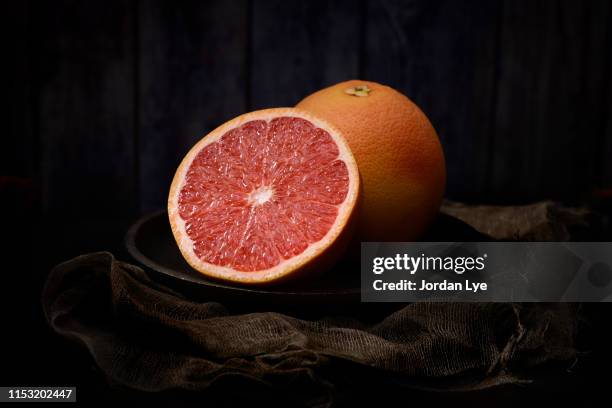 pink grapefruit - pink grapefruit stock pictures, royalty-free photos & images