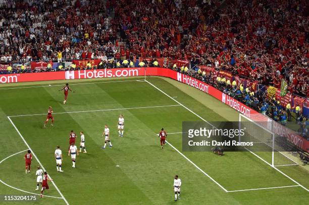 Divock Origi of Liverpool celebrates after scoring his team's second goal during the UEFA Champions League Final between Tottenham Hotspur and...