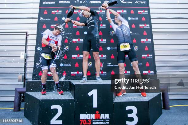Pablo Danepa Gonzalez of Spain, Andi Boecherer of Germany and Sven Riederer of Switzerland during the flower ceremony of the IRONMAN 70.3 Rapperswil...