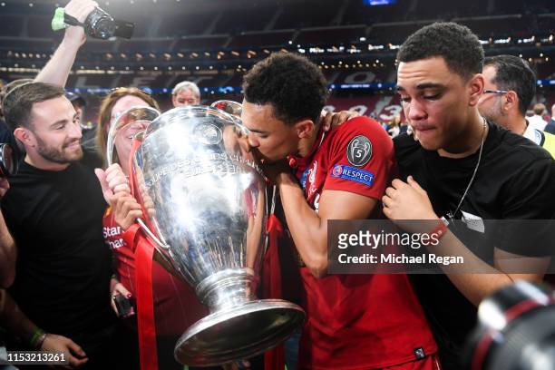 Trent Alexander-Arnold of Liverpool celebrates with the European Cup and members of his family during the UEFA Champions League Final between...