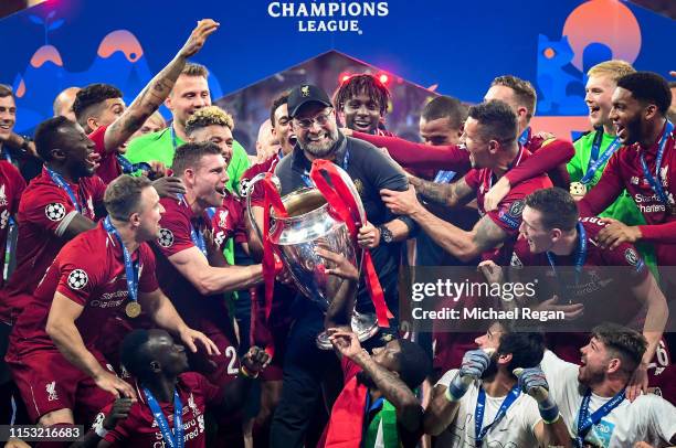 Jurgen Klopp, Manager of Liverpool celebrates with the Champions League Trophy after winning the UEFA Champions League Final between Tottenham...