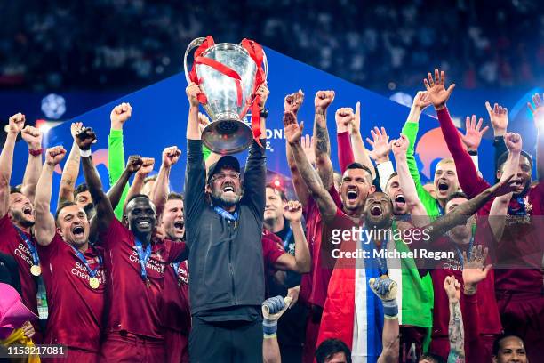 Jurgen Klopp, Manager of Liverpool celebrates with the Champions League Trophy after winning the UEFA Champions League Final between Tottenham...