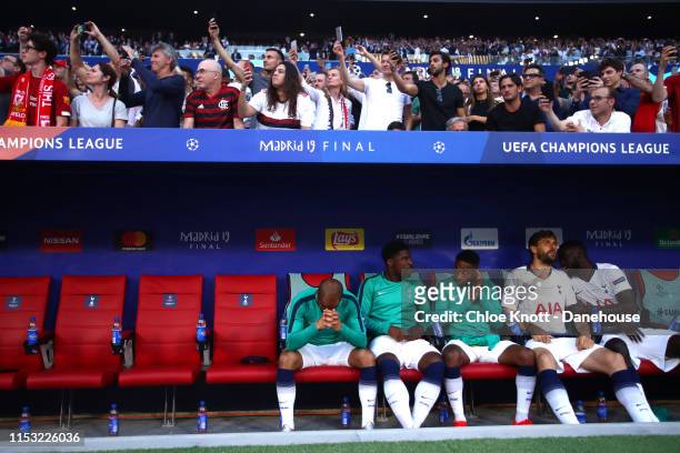 Lucas Moura of Tottenham Hotspur holds his head in his hands as he sits in the dug out ahead of the UEFA Champions League Final between Tottenham...