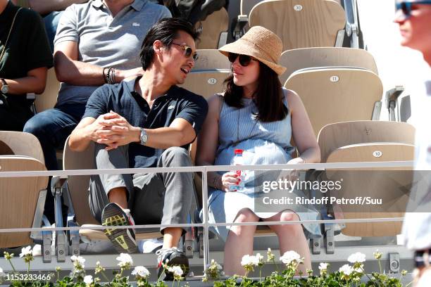 Actor Frederic Chau and his pregnant wife attend the 2019 French Tennis Open - Day Eight at Roland Garros on June 02, 2019 in Paris, France.