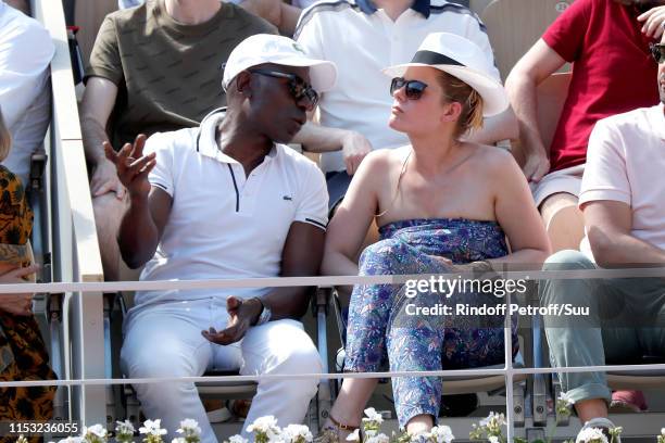 Lucien Jean-Baptiste and Aurelie Nollet attend the 2019 French Tennis Open - Day Eight at Roland Garros on June 02, 2019 in Paris, France.