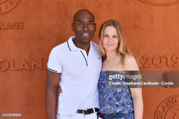 Lucien Jean-Baptiste and Aurelie Nollet attend the 2019 French Tennis Open - Day Eight at Roland Garros on June 02, 2019 in Paris, France.