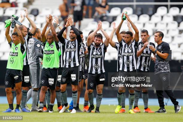 Players of Botafogo acknowledge the fans after a match between Botafogo and Vasco da Gama as part of the Brasileirao Series A championship at...