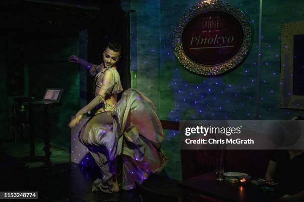 Male belly dancer Segah dances onstage at a nightclub on June 01, 2019 in Istanbul, Turkey. Male belly dancers or “zennes” date back to the final...