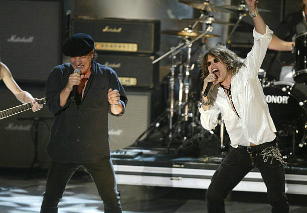 Brian Johnson of AC/DC and Steven Tyler during The 18th Annual Rock and Roll Hall of Fame Induction Ceremony - Show at The Waldorf Astoria in New...