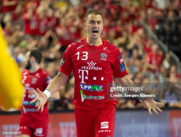 Momir Ilic of Veszprem celebrates during the VELUX EHF Champions League final match between HC Vardar and Telekom Veszprem HC at Lanxess Arena on...