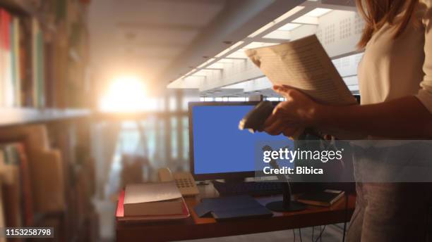 Librarian Using Computer Librarian Computer Photos and Premium High Res Pictures - Getty Images