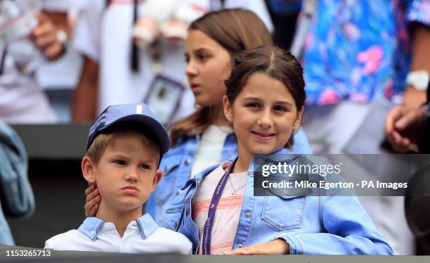The children of Roger Federer watch his match on day two of the Wimbledon Championships at the All England Lawn Tennis and Croquet Club, Wimbledon.