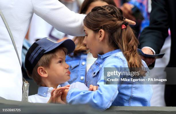 The children of Roger Federer watch his match on day two of the Wimbledon Championships at the All England Lawn Tennis and Croquet Club, Wimbledon.
