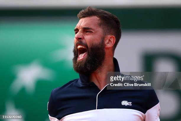 Benoit Paire of France celebrates winning the second set during his mens singles fourth round match against Kei Nishikori of Japan during Day eight...