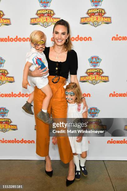 Ford Armand Douglas Hammer, Elizabeth Chambers, and Harper Grace Hammer attend the "PAW Patrol Mighty Pups Super Paws" advance screening at...