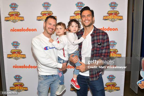 Jason Landau, Ethan Jackson, Willow Jackson, and Cheyenne Jackson attend the "PAW Patrol Mighty Pups Super Paws" advance screening at Nickelodeon in...