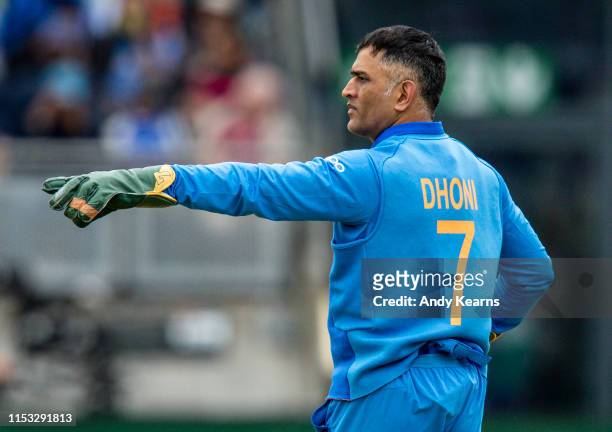 Dhoni of India issues instructions during the Group Stage match of the ICC Cricket World Cup 2019 between Bangladesh and India at Edgbaston on July...