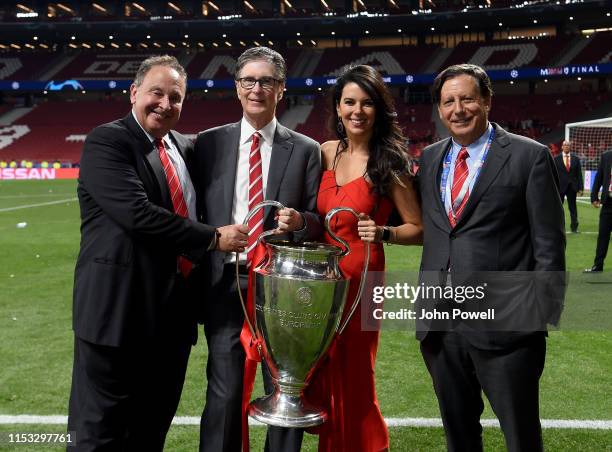 John Henry, Linda Pizzuti Henry and Tom Werner owner's of Liverpool lifting the UEFA Champions League trophy the UEFA Champions League Final between...