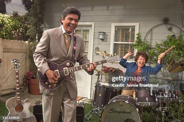 George Lopez and Belita Moreno, who star on the ABC primetime hit series "The George Lopez Show", play their Gibson Trans Black Les Paul and...
