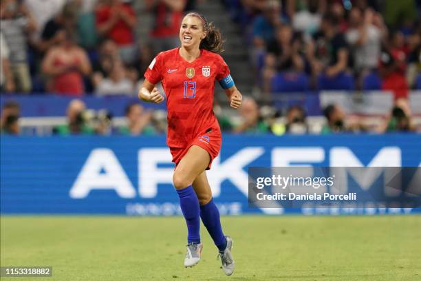 Alex Morgan of the USA celebrates scoring her goal during the 2019 FIFA Women's World Cup France Semi Final match between England and USA at Stade de...